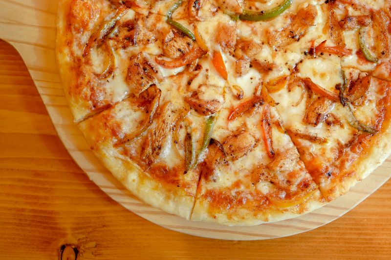 BBQ Chicken punch pizza with caramelized onions
