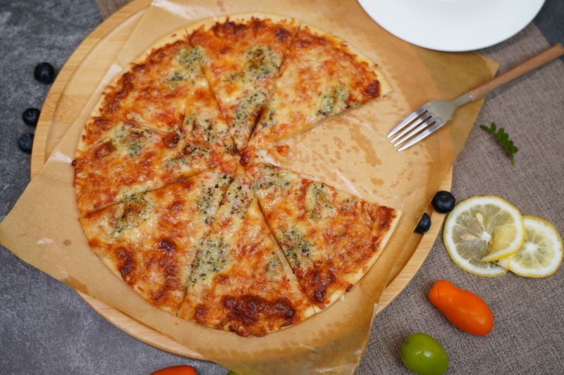 Hawaiian punch pizza with ham and pineapple